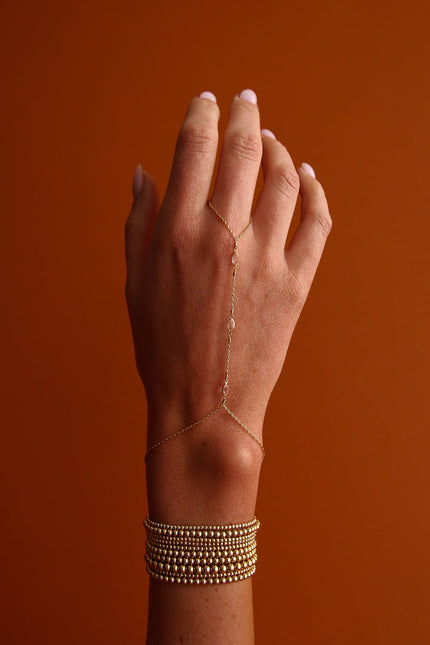 Hand Chain con Topacio blanco