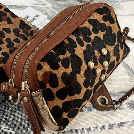 Bolso de cuero Make me up. Tamaño: mini. Color: Terracota animal print y dorado