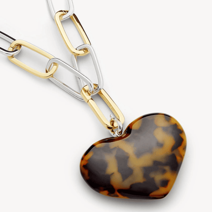 Elaborado en latón reciclado con baño de rodio y oro de 14k, la Cadena Grande Paperclip es el complemento perfecto para nuestro nuevo colgante de acetato italiano. Color: Classic Tortoise