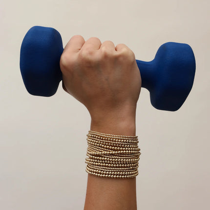 Pulsera dorada 14K gold filled con cuentas de 2 mm y acabado brillante