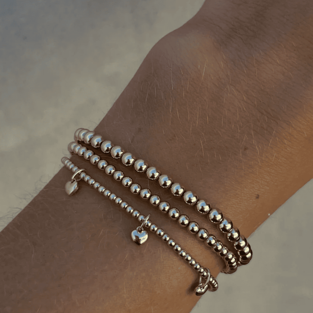 Gold Bracelet with 3 Heart Charms
